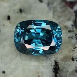 BlueZircon_cushion_10.6x7.9mm_5.05cts_zn2293.jpg