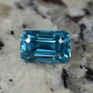 BlueZircon eme cut 10.8x7.0mm 6.94cts H zn2300
