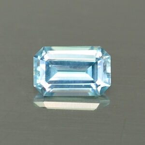 BlueZircon eme cut 6.3x4.0mm 0.96cts H zn4570