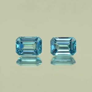 BlueZircon eme cut pair 9.1x6.5x4.5mm 8.9x6.3x4.1mm 6.41cts H zn7779 scaled 1