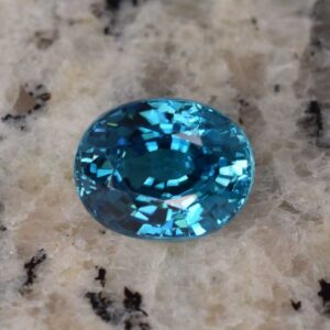 BlueZircon oval 10.1x8.0mm 4.96cts H zn1648 b SOLD
