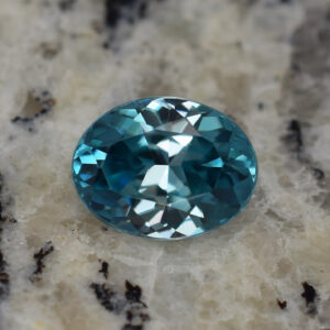 BlueZircon oval 11.4x8.9mm 5.85cts H zn311 b crop