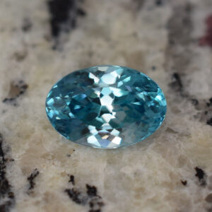 BlueZircon oval 12.0x8.3mm 6.53cts H zn312 b crop