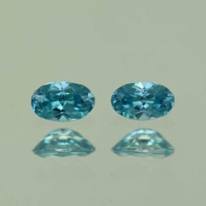 BlueZircon oval pair 4.9x3.0mm 0.65cts H zn4764 SOLD