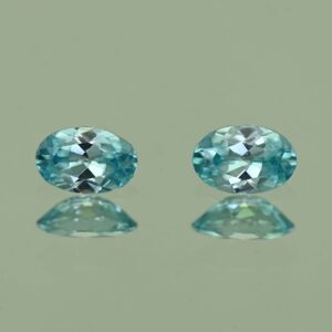 BlueZircon oval pair 6.0x4.0mm 1.16cts H zn2187