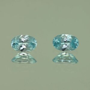 BlueZircon oval pair 6.0x4.0mm 1.22cts H zn2201 scaled 1