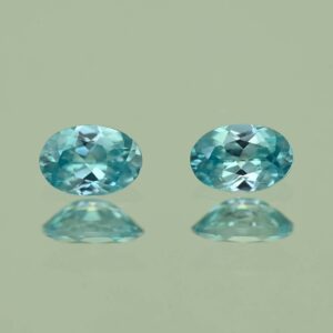 BlueZircon oval pair 6.0x4.0mm 1.25cts H zn2188