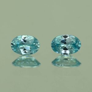 BlueZircon oval pair 6.0x4.0mm 1.27cts H zn2190