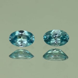 BlueZircon oval pair 6.0x4.0mm 1.27cts H zn2191