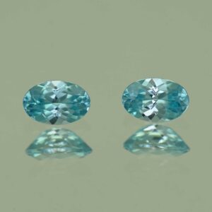 BlueZircon oval pair 6.0x4.0mm 1.30cts H zn2192 SOLD