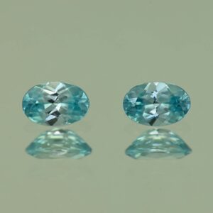BlueZircon oval pair 6.0x4.0mm 1.35cts H zn2193