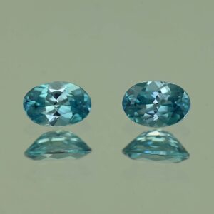 BlueZircon oval pair 6.0x4.0mm 1.35cts H zn4772