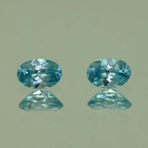 BlueZircon oval pair 6.0x4.0mm 1.43cts H zn2195 SOLD