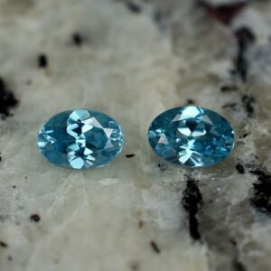 BlueZircon oval pair 6.4x4.5mm 1.66cts zn2614