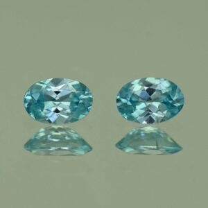 BlueZircon oval pair 6.5x4.5mm 1.53cts H zn4774