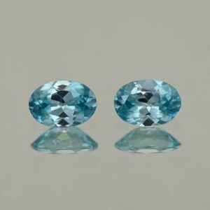 BlueZircon oval pair 7.0x5.0mm 1.94cts H zn2196