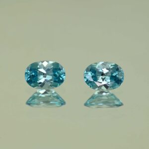 BlueZircon oval pair 7.0x5.0mm 2.11cts H zn7543 scaled 1