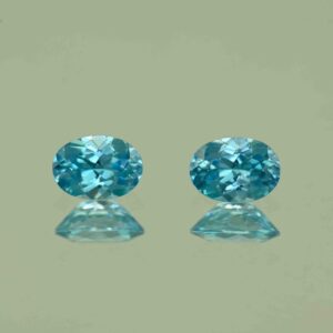 BlueZircon oval pair 7.0x5.0mm 2.20cts H zn7545 scaled 1 SOLD