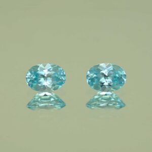BlueZircon oval pair 7.0x5.0mm 2.23cts H zn7546 scaled 1 SOLD