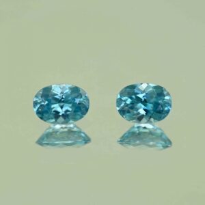 BlueZircon oval pair 7.0x5.0mm 2.27cts H zn7547 scaled 1 SOLD