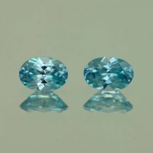 BlueZircon oval pair 7.0x5.0mm 2.29cts H zn4781 scaled 1