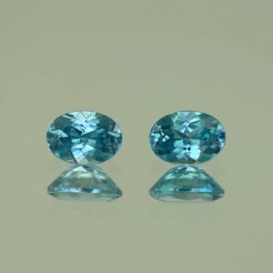 BlueZircon oval pair 7.0x5.0mm 2.43cts H zn7548 scaled 1 SOLD