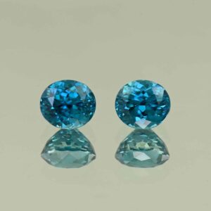 BlueZircon oval pair 7.0x6.2x5.2mm 4.52cts H zn7790 SOLD