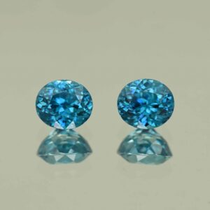 BlueZircon oval pair 7.4x6.5x5.3mm 4.97cts H zn7791 scaled 1 SOLD