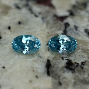 BlueZircon oval pair 7.5x5.0mm 2.61cts zn2612 SOLD