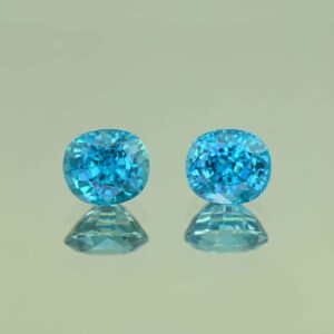 BlueZircon oval pair 8.8x7.7x6.1mm 8.7x7.7x6.0mm 7.94cts H zn7754 scaled 1 SOLD