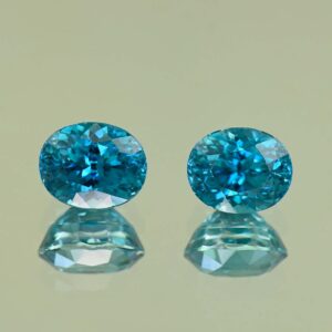 BlueZircon oval pair 8.9x7.1x6.2mm 8.6x7.0x6.1mm 7.63cts H zn8056