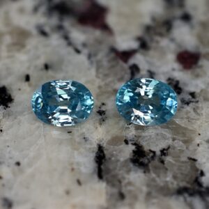 BlueZircon oval pair 9.0x6.8mm 5.58cts zn1928