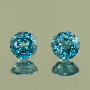 BlueZircon round pair 5.7x5.6x3.2mm 5.6x5.5x3.3mm 2.05cts H zn8091