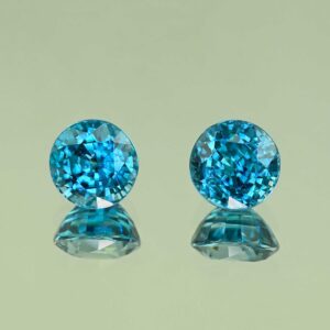 BlueZircon round pair 9.5x9.5x6.8mm 9.5x9.3x7.2mm 12.13cts H zn8226