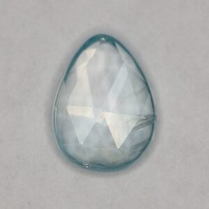 IceBlueZircon freeform rose cut 9.5x7.0mm 2.31cts zn3587