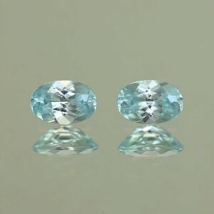 IceBlueZircon oval pair 6.0x4.0mm 1.30cts H zn7091