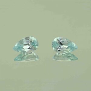 IceBlueZircon pear pair 10.6x6.6mm 5.59cts H zn7474 scaled 1