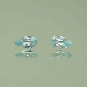 IceBlueZircon pear pair 7.0x4.0mm 1.38cts H zn7462 scaled 1