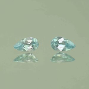 IceBlueZircon pear pair 7.0x4.0mm 1.48cts H zn7465 scaled 1