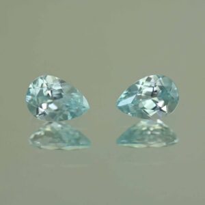 IceBlueZircon pear pair 7.0x5.0mm 1.97cts H zn7097 scaled 1