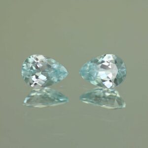 IceBlueZircon pear pair 7.0x5.0mm 1.99cts H zn7098 scaled 1