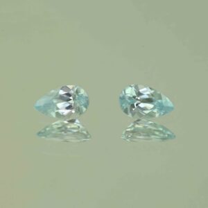 IceBlueZircon pear pair 7.5x4.5mm 1.83cts H zn7467 scaled 1