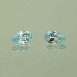 IceBlueZircon pear pair 8.0x5.0mm 2.10cts H zn7468 scaled 1
