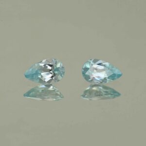 IceBlueZircon pear pair 8.0x5.0mm 2.32cts H zn7470 scaled 1