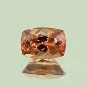 ImperialZircon cush 7.6x5.3mm 1.58cts H zn7397