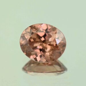 ImperialZircon oval 12.2x10.2mm 6.97cts H zn7322 scaled 1