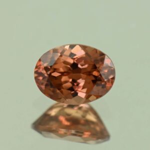 ImperialZircon oval 7.4x5.5mm 1.65cts H zn4047