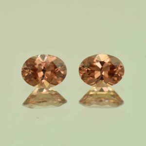 ImperialZircon oval pair 7.5x5.5mm 2.78cts H zn6857 scaled 1