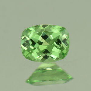 MintGrossular cush 6.0x4.6mm 0.56cts N mg389
