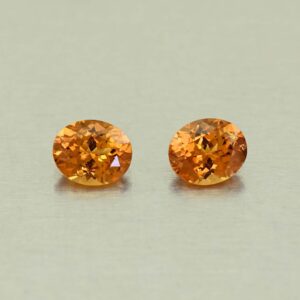OrangeGrossular oval pair 6.4x5.3mm 1.66cts N og376